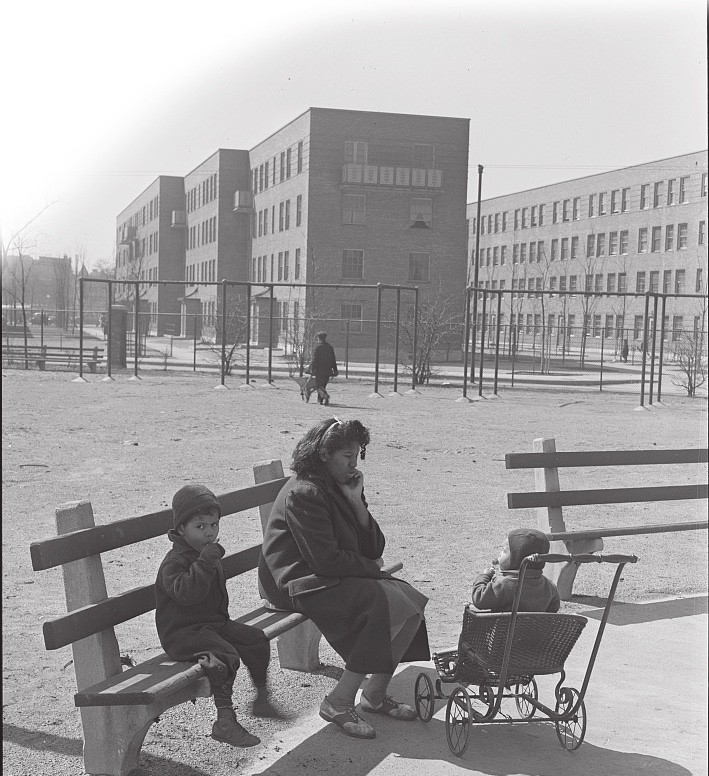 Mother and children in a playground at the Ida B. Wells Housing Project, Chicago