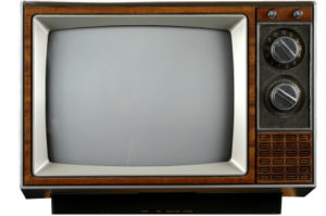 Old grungy Vintage TV with clipping path over a white background