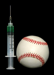 Baseball and steroids isolated over a black background.
