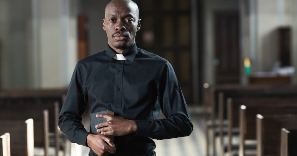 black pastor priest church