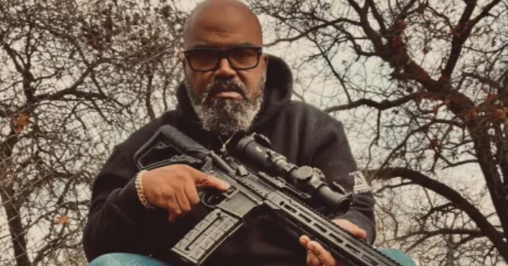 Murner R. Hilliard Jr. black man holding gun