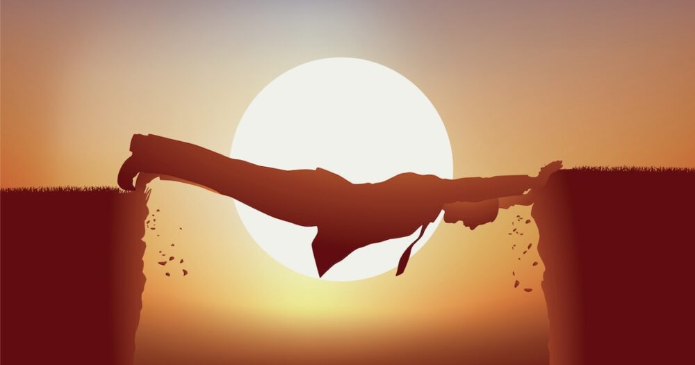 man balanced over cliff foolish falling