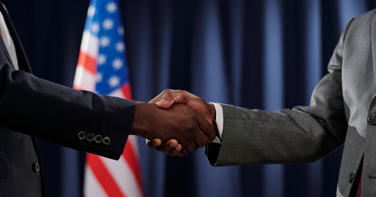 black men handshake politicians congress